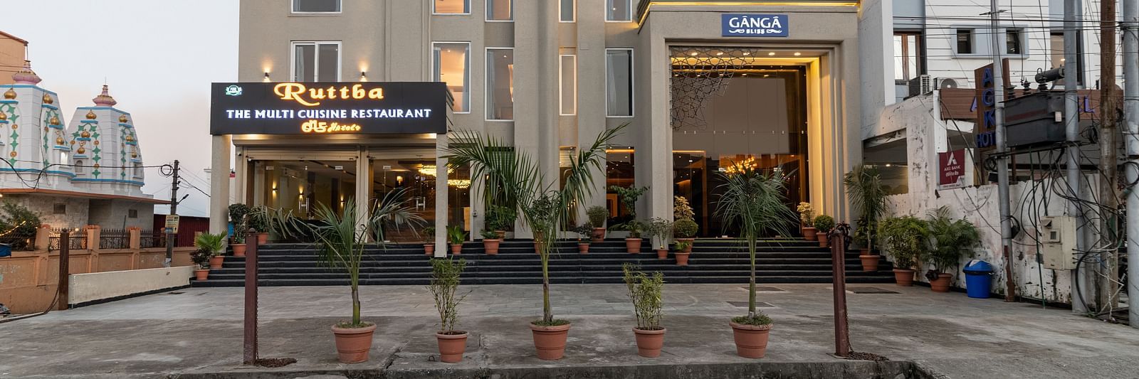 A facade image shot from the front of DLS Ganga Bliss, Haridwar with a clear sky in the background